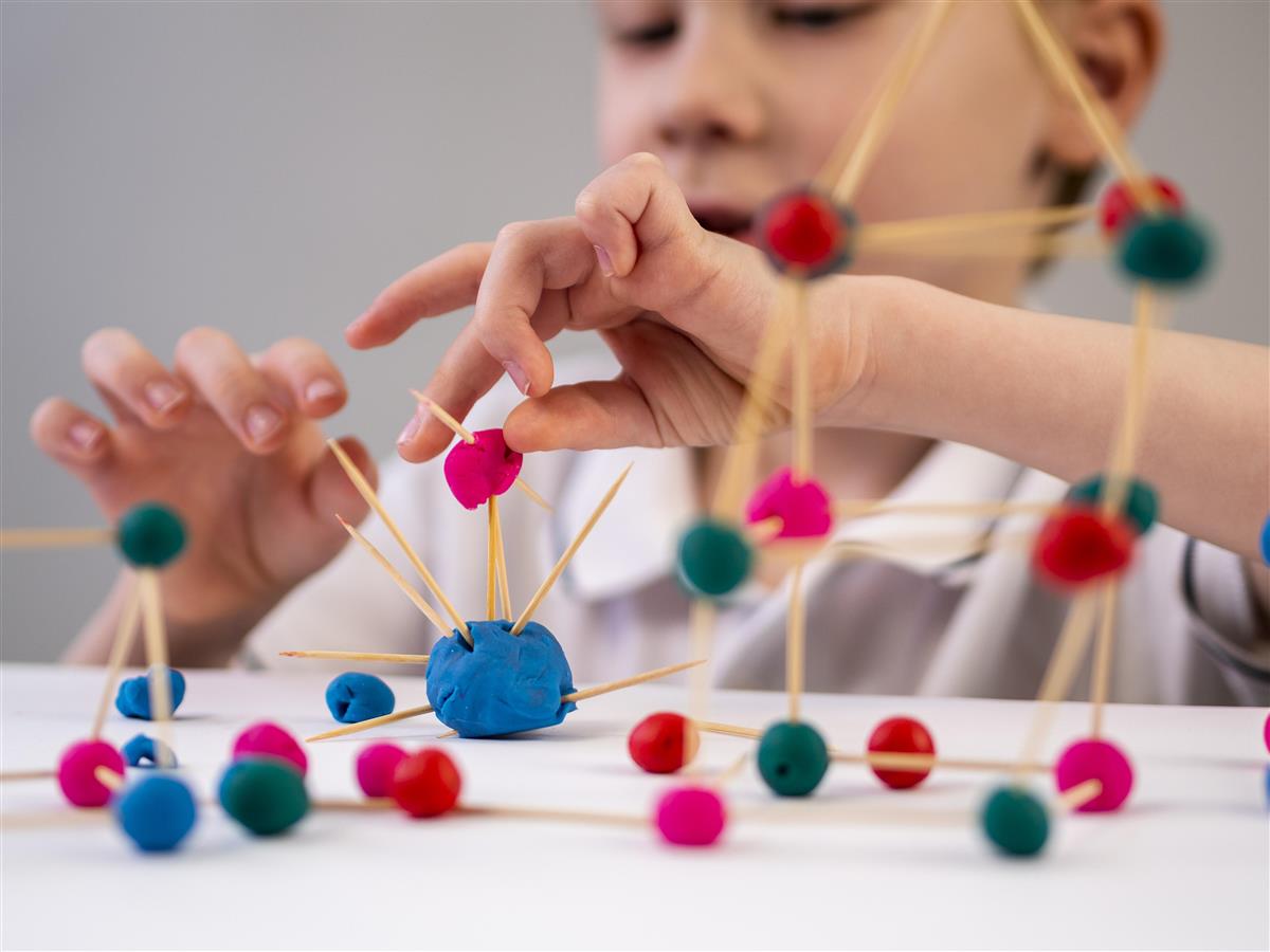 boy-playing-with-chemistry-game.jpg